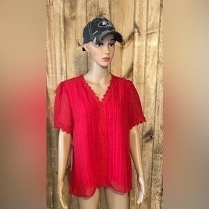 Woman’s sheer shirt, size medium